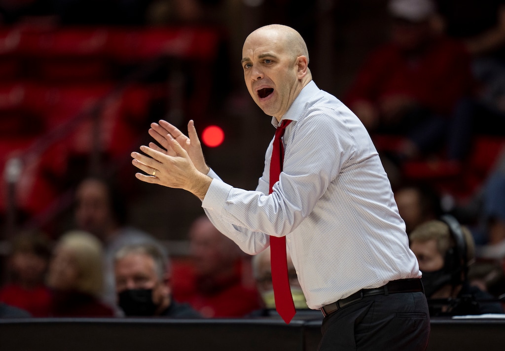 (Rick Egan | The Salt Lake Tribune) Utah head coach Craig Smith, cheers on his team, in the Utes 96-62 win over the Manhattan Jaspers at the Jon M.Huntsman Center, on Saturday, December 11, 2021.