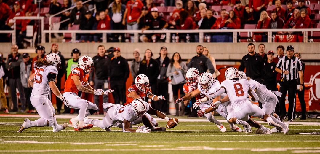 (Trent Nelson | The Salt Lake Tribune)  Utah and Stanford players dive for an onside kick in the final minute as the University of Utah hosts Stanford, NCAA football at Rice-Eccles Stadium in Salt Lake City Saturday October 7, 2017.