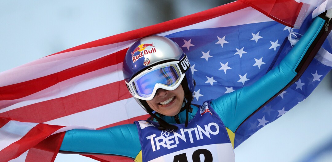 Sarah Hendrickson of the United States celebrates after winning the women's ski jumping HS106 Individual of the Nordic Ski World Championships in Val di Fiemme, Italy, Friday, Feb. 22, 2013.  (AP Photo/Matthias Schrader)
