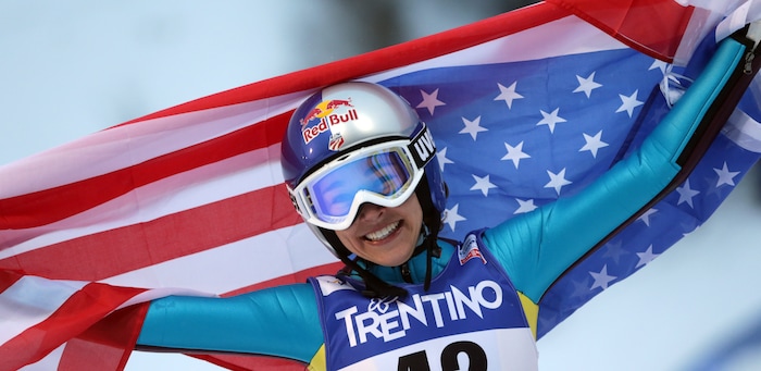 Sarah Hendrickson of the United States celebrates after winning the women's ski jumping HS106 Individual of the Nordic Ski World Championships in Val di Fiemme, Italy, Friday, Feb. 22, 2013.  (AP Photo/Matthias Schrader)