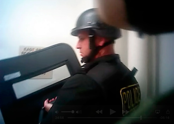This photo from police officer video body camera footage on Oct. 1, 2017, provided by the Las Vegas Metropolitan Police Department, shows officers deploying a shield and weapons during the deadliest mass shooting in modern U.S. history by Stephen Paddock, at the Mandalay Bay Hotel in Las Vegas, released Wednesday, May 2, 2018. (Las Vegas Metropolitan Police Department via AP)