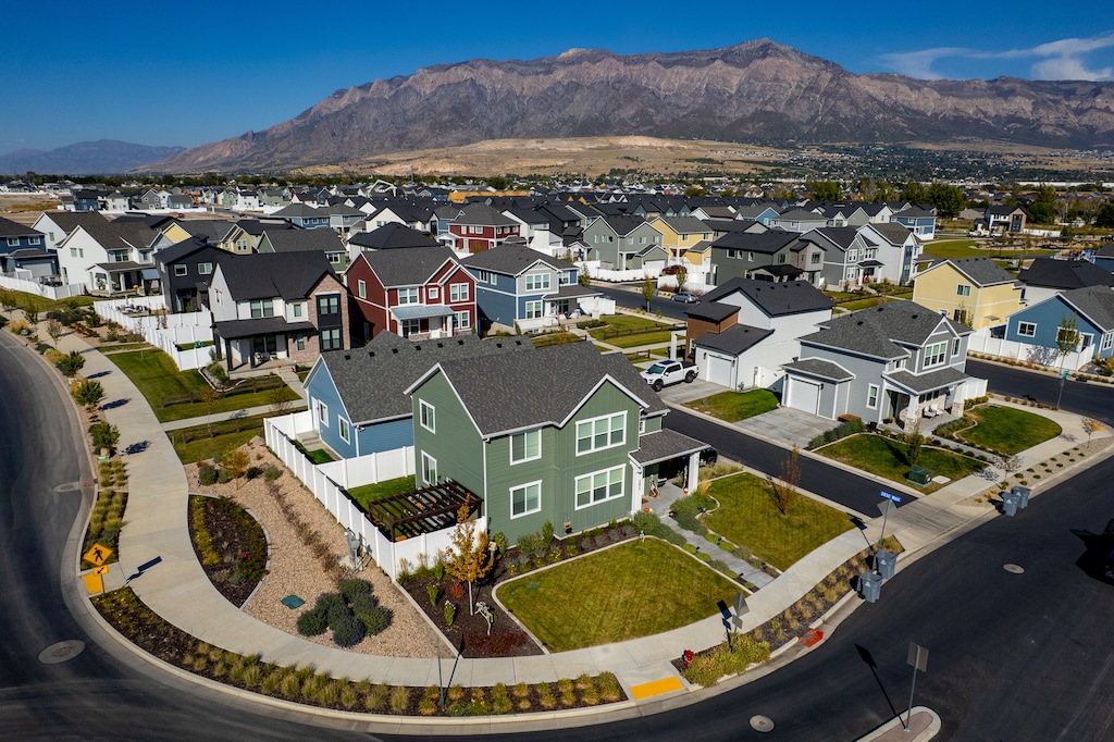 (Trent Nelson | The Salt Lake Tribune) There will eventually be 275 starter homes at the JDC Ranch development in Plain City on Tuesday, Oct. 6, 2026. The homes blend into the neighborhood but are smaller and have a one-car garage or no garage at all, rather than a two-car garage.