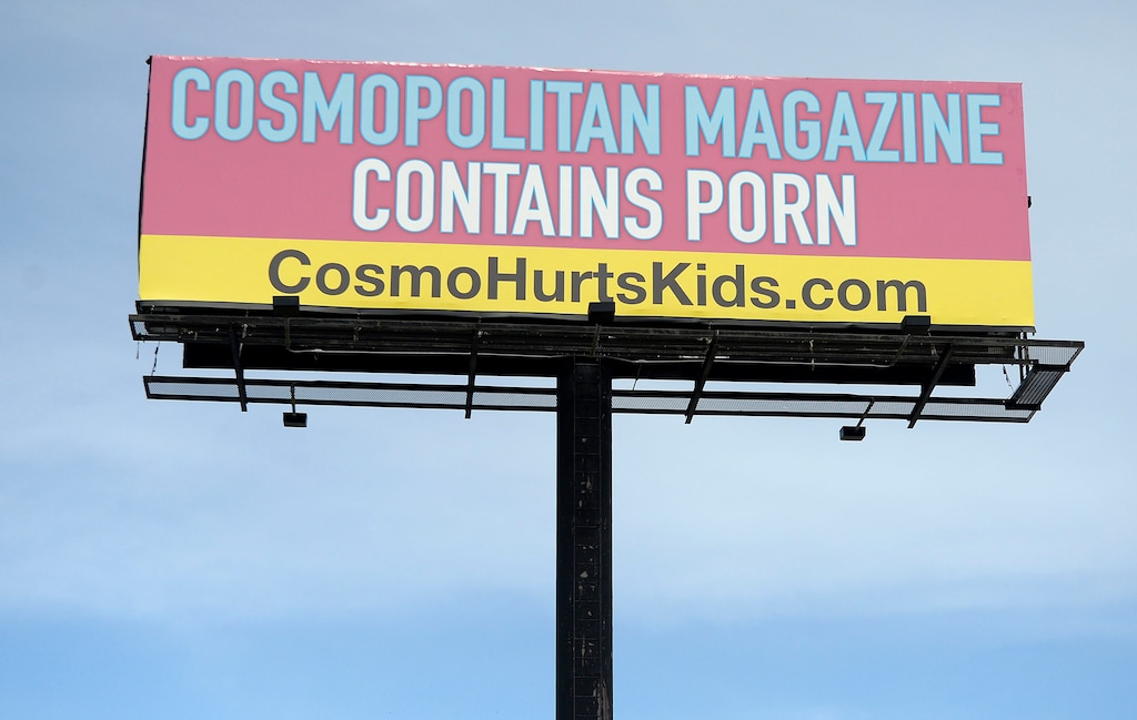 (Al Hartmann  |  The Salt Lake Tribune) 	Brightly colored billboard just north of the 5300 S. exit on I-15 northbound claims that Cosmopolitan magazine is pornographic. That ad campaign is central to a move that may revive the long-dormant state office that was popularly called the porn czar.