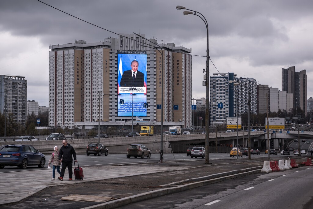 (The New York Times)

An image of President Vladimir Putin is displayed on a monitor on the side of a hotel on the outskirts of Moscow during his annual address on April 21, 2021. The Russian leader is undoing the social freedoms introduced at the end of the Soviet Union, risking a return to total control and ideological isolation.