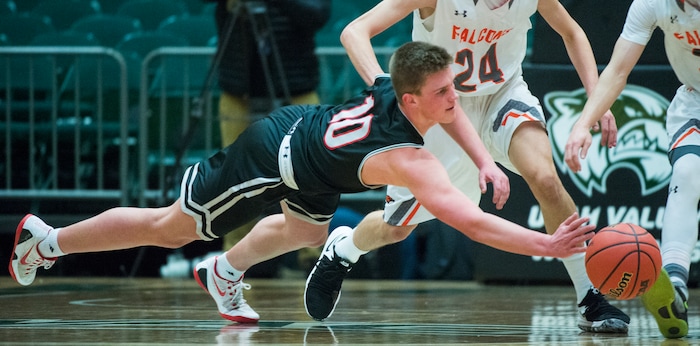 (Rick Egan  |  The Salt Lake Tribune)   Bountiful Braves Brig Willard (10) dives for a loose ball, in 5A basketball playoff action between the Bountiful Braves and Skyridge Falcons, at the UCCU Center in Orem, Monday, Feb. 26, 2018.