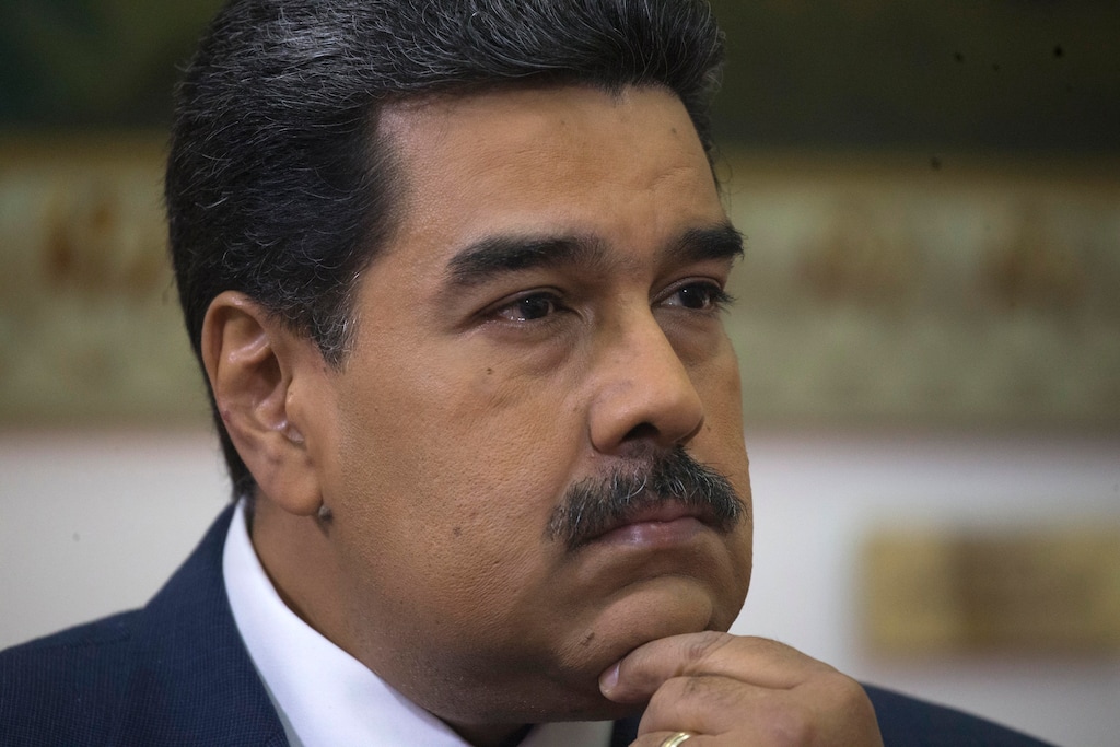 (Ariana Cubillos | The Associated Press) Venezuela's President Nicolas Maduro listens during an interview with The Associated Press at Miraflores presidential palace in Caracas, Venezuela, Thursday, Feb. 14, 2019. Even while criticizing Donald Trump's confrontational stance toward his socialist government, Maduro said he holds out hope of meeting the U.S. president to resolve an impasse over his recognition of opponent Juan Guaido as Venezuela's rightful leader.