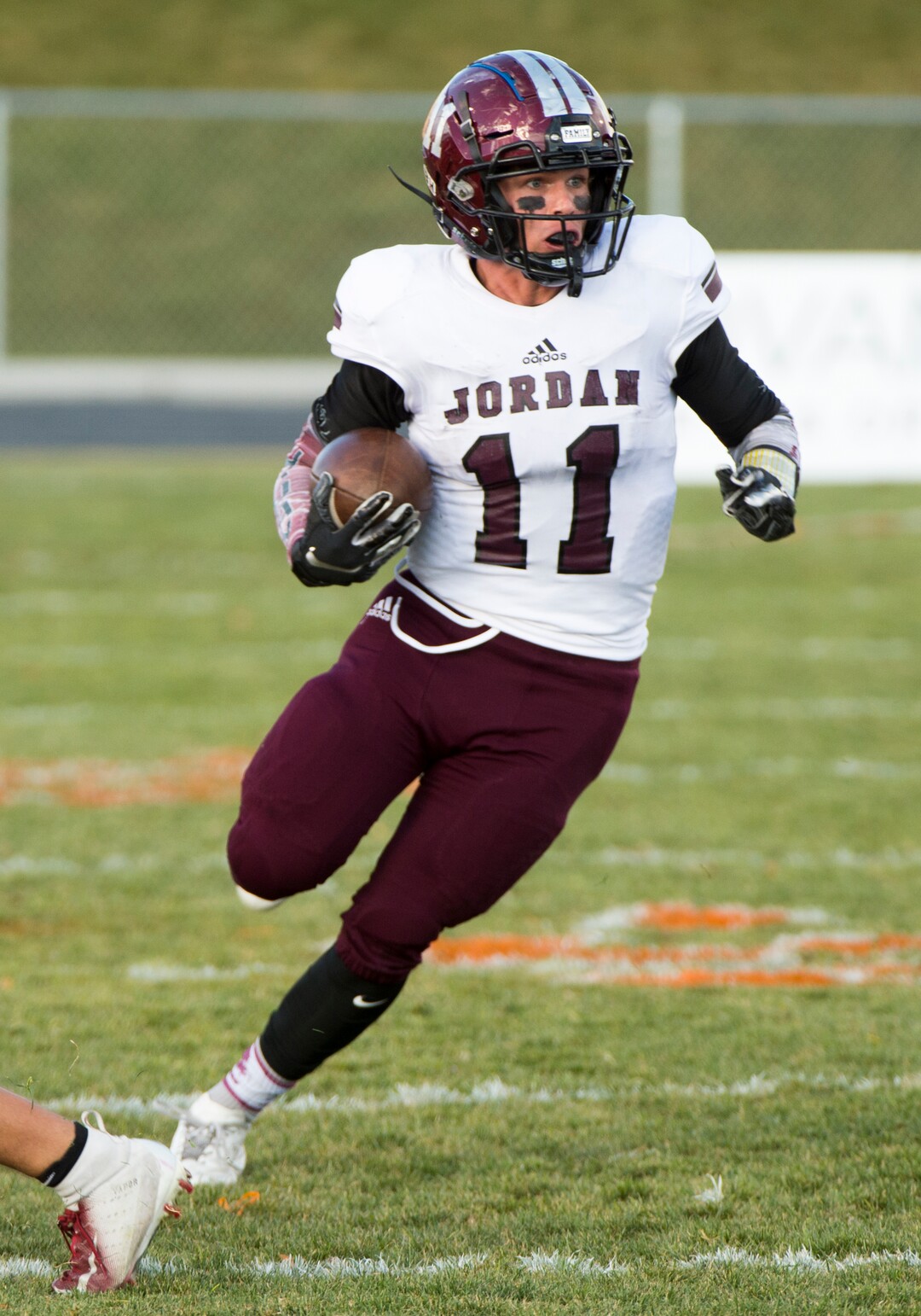 (Rick Egan  |  The Salt Lake Tribune)   Jordan running back Jake Shaver (11) runs for a huge gain, in prep 5A playoff action between Jordan High and Skyridge High, in Lehi, Friday, Nov. 2, 2018.