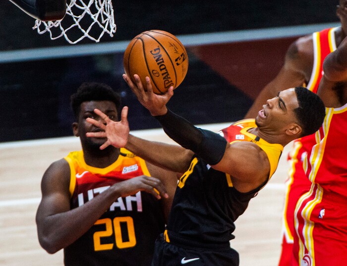 (Rick Egan | The Salt Lake Tribune) Utah Jazz guard Shaquille Harrison (8) takes the ball to the hoop, in NBA action between the Utah Jazz and the Atlanta Hawks at Vivint Arena, on Friday, Jan. 15, 2021.