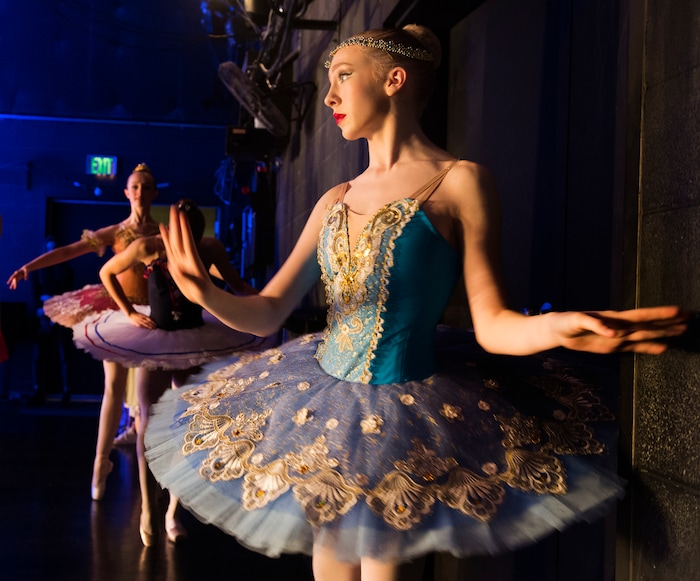 (Rick Egan  |  The Salt Lake Tribune)   Kate Burckle watches the other dancers perform, as she waits for her turn to compete in the 2018 Youth America Grand Prix Regional Semi-Finals at the University of Utah Marriott Center for Dance, Saturday, Feb. 17, 2018.