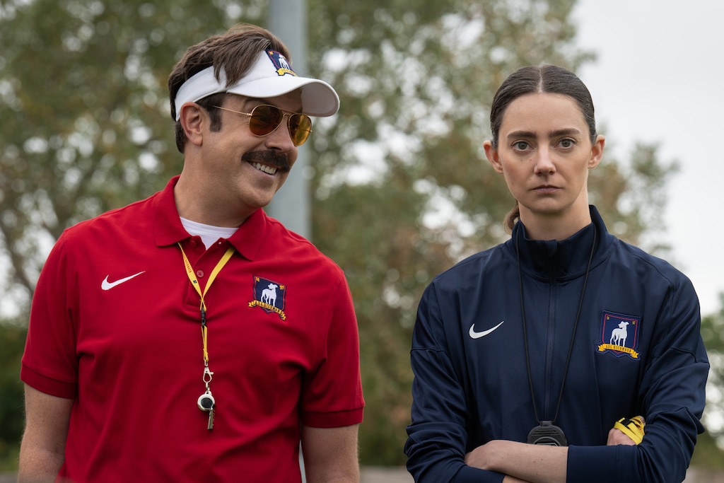 (Apple TV) Ted Lasso (Jason Sudeikis) talks to his assistant coach, Alice Chilton (Tanya Reynolds), in an episode of "Ted Lasso."