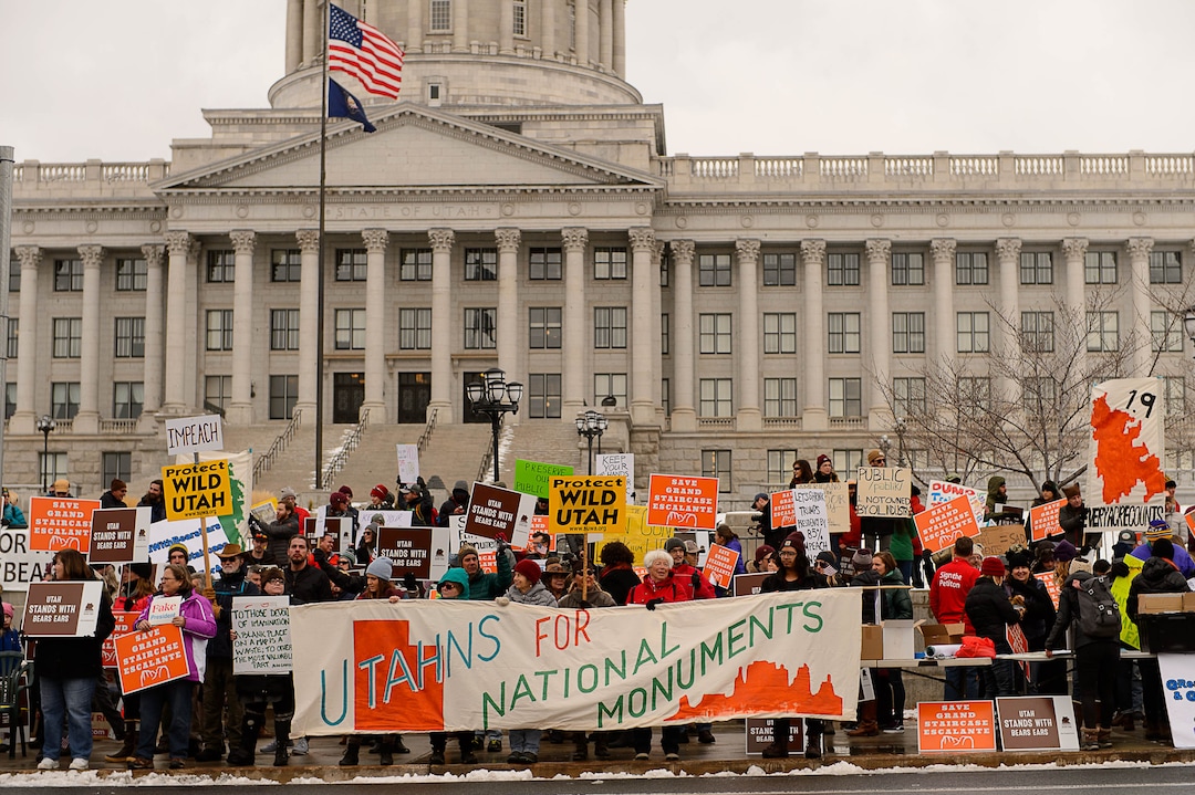 (Trent Nelson | The Salt Lake Tribune)  Protesters gather before a visit by President Donald Trump, Monday December 4, 2017.