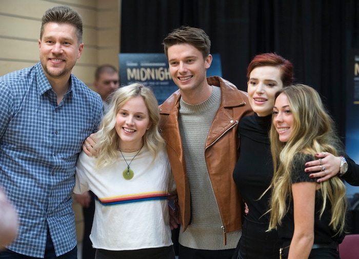 (Leah Hogsten  |  The Salt Lake Tribune) Director Scott Speer, left, Lexi Crump, actors Patrick Schwarzenegger and  Bella Thorne and Melissa Meikle pose for pictures. Thorne and Schwarzenegger autographed posters and met fans to promote their upcoming young-adult romance, "Midnight Sun," during a stop at the Fashion Place Mall in Murray on Tuesday, March 6, 2018. The movie opens March 23.