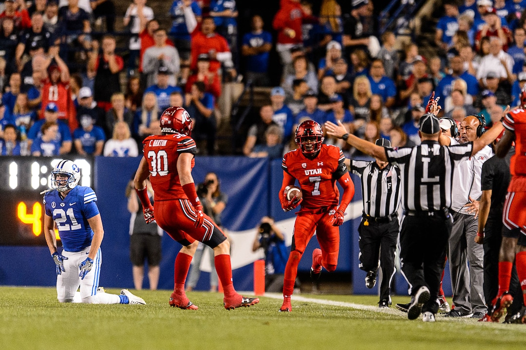 (Trent Nelson | The Salt Lake Tribune)  Utah Utes defensive back Jaylon Johnson (7) intercepts a BYU pass in the third quarter as BYU hosts Utah, NCAA football in Provo, Saturday September 9, 2017.