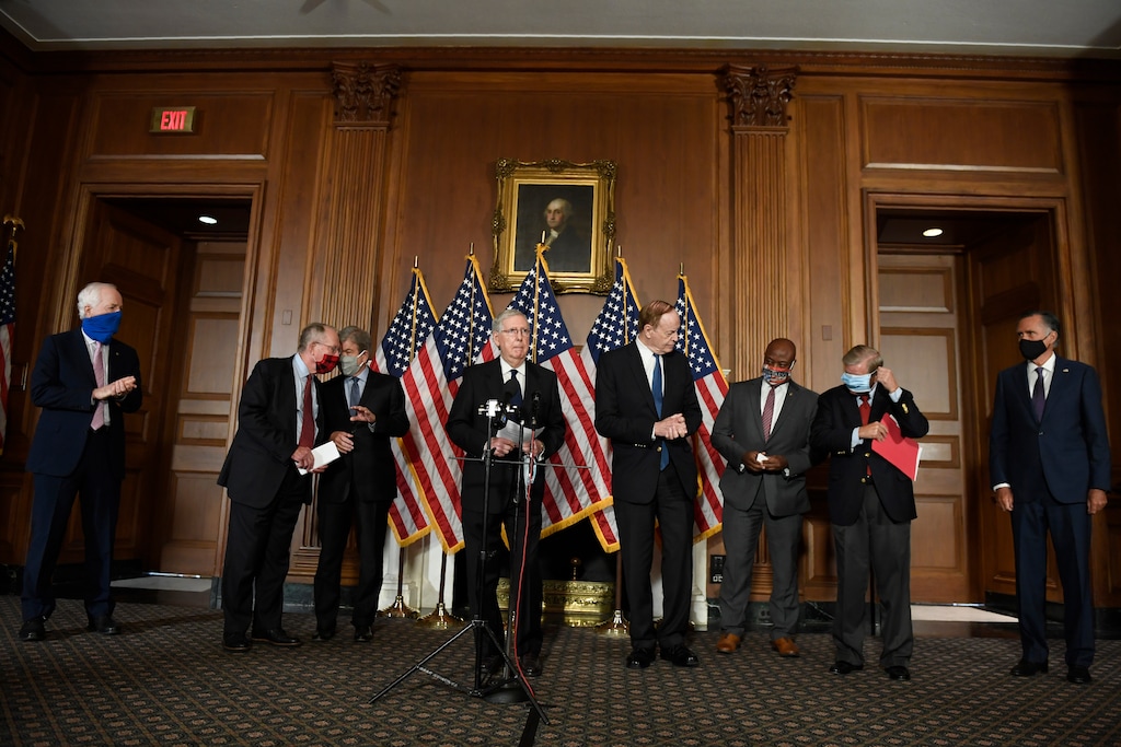 (Susan Walsh | AP) Senate Majority Leader Mitch McConnell of Ky., during a news conference on on Capitol Hill in Washington, Monday, July 27, 2020, to highlight their proposal for the next coronavirus stimulus bill. McConnell is joined by, from left, Sen. John Cornyn, R-Texas, Sen. Lamar Alexander, R-Tenn., Sen. Roy Blunt, R-Mo., Sen. Richard Shelby, R-Ala., Sen. Tim Scott, R-S.C., Sen. Lindsey Graham, R-S.C., and Sen. Mitt Romney, R-Utah.