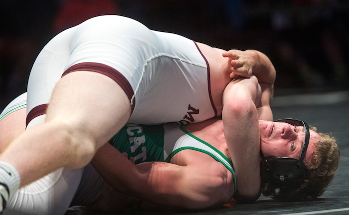 (Rick Egan  |  The Salt Lake Tribune)   Chase Trussell (Morgan) wrestles Gordon Hermansen (South Summit) in the 220 weight class, Trussell won the match for the in 3A State Wrestling title at UVU in Orem, Saturday, February 10, 2018.