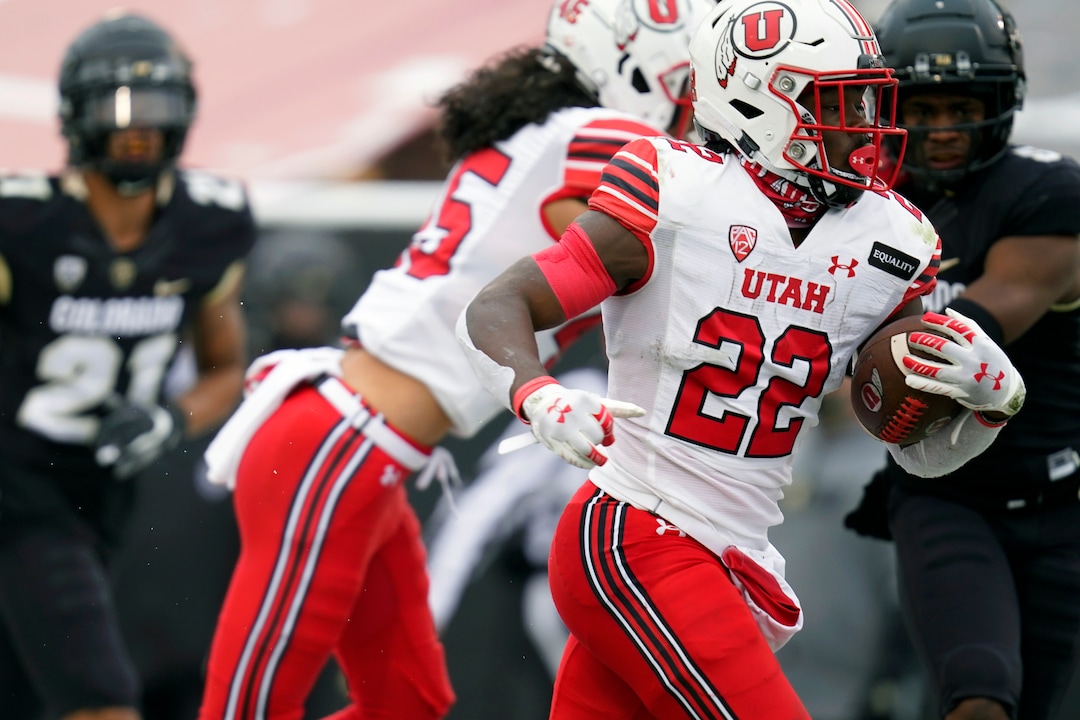 (David Zalubowski | AP file photo) Utah running back Ty Jordan runs for a touchdown against Colorado in the second half of an NCAA college football game Saturday, Dec. 12, 2020, in Boulder, Colo. Utah won 38-21. Jordan died this week in Texas.
