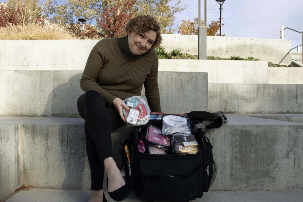 (Sarah Kerr  |  Daily Utah Chronicle) Liz Whittaker, an intimacy director who works with film and stage productions, shows the bag in which she carries her supplies.
