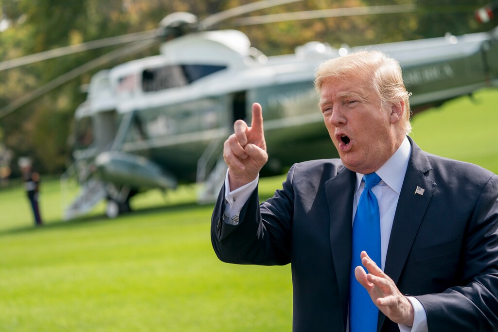 President Donald Trump speaks to reporters before boarding Marine One on the South Lawn of the White House in Washington, Wednesday, Oct. 25, 2017, for a short trip to Andrews Air Force Base, Md. and then on to Dallas. (AP Photo/Andrew Harnik)