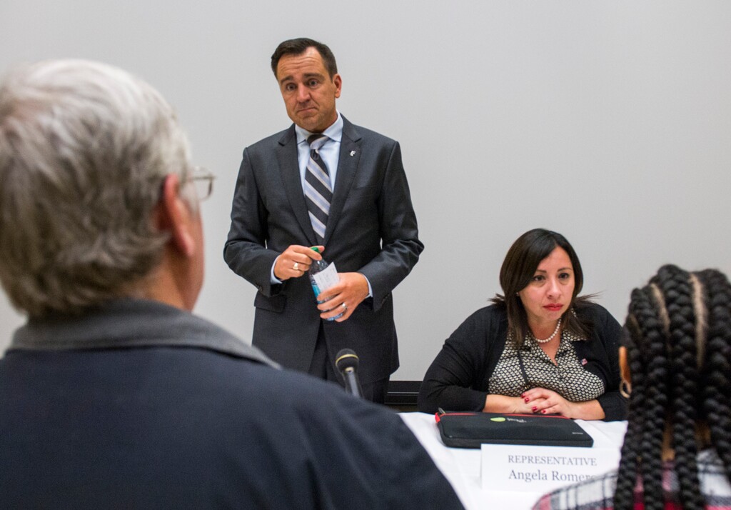 Rick Egan  |  The Salt Lake TribuneGreg Hughes, Speaker of the Utah House of Representatives andState Representative Angela Romero visit with citizens after participating on a panel of state and community leaders as they discussed issues surrounding homelessness in Salt Lake County at Salt Lake Community College South City Campus, Monday, February 13, 2017.