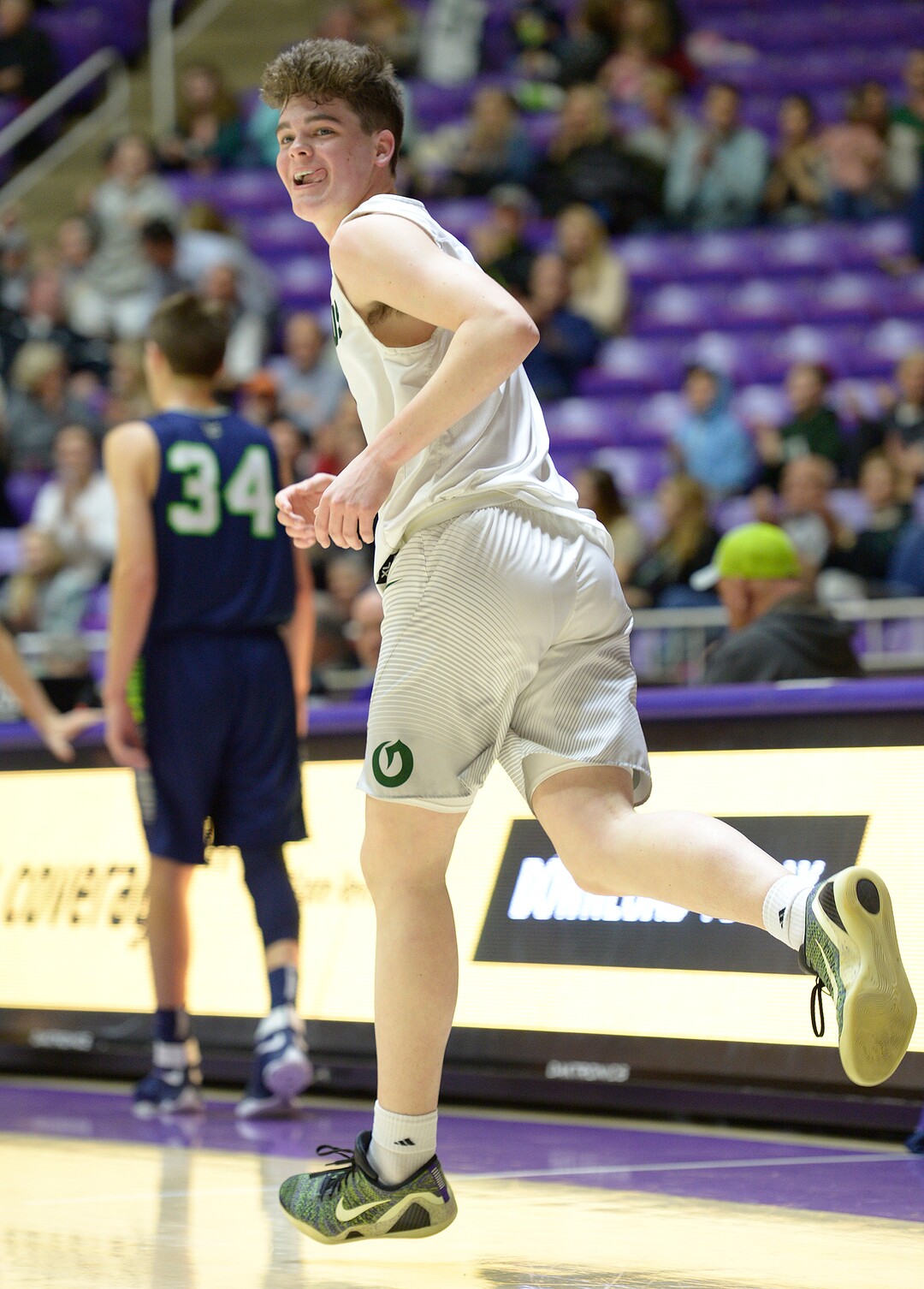 Leah Hogsten  |  The Salt Lake TribuneOlympus' Jeremy Dowdell reacts to sinking a 3-pointer. Olympus High School leads Timpanogos High School 53-27 during their 4A State boysÕ basketball quarterfinal playoff game at Weber State University's Dee Events Center, Thursday, March 2, 2017.