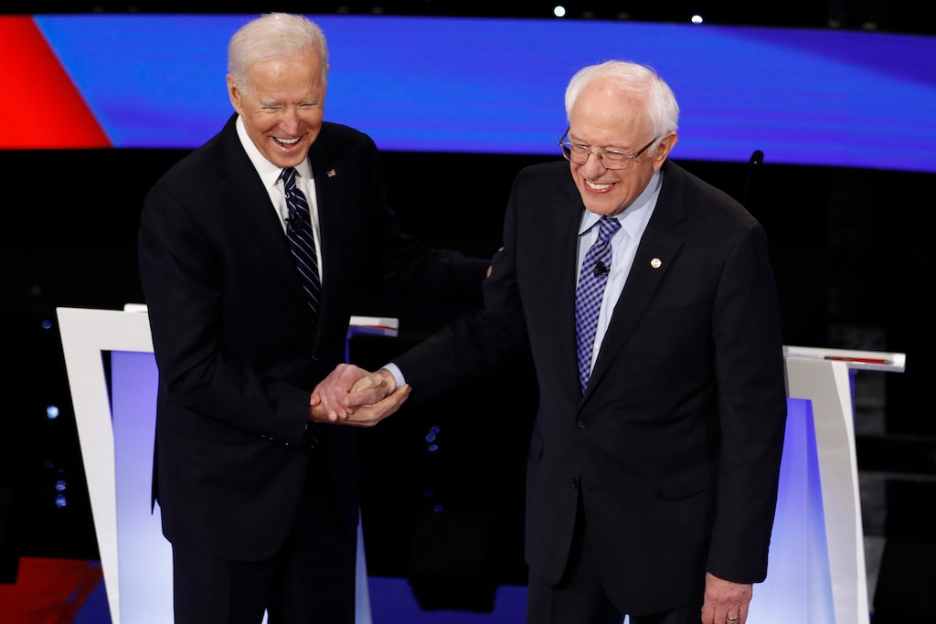 (Patrick Semansky | AP) Democratic presidential candidates former Vice President Joe Biden, left, and Sen. Bernie Sanders, I-Vt., greet each other Tuesday, Jan. 14, 2020, before a Democratic presidential primary debate hosted by CNN and the Des Moines Register in Des Moines, Iowa.