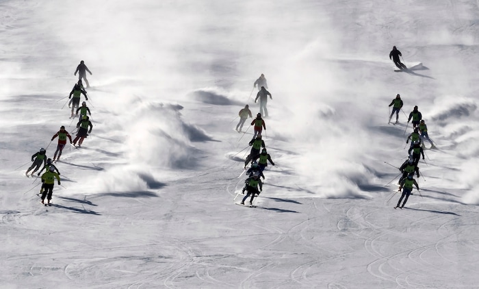 South and North Korean skiers attend their joint training at the Masik Pass ski resort in North Korea, Thursday, Feb. 1, 2018. North Korean skiers and skaters on Thursday arrived at a South Korean airport to participate in the Winter Olympics that has brought a temporary lull in tensions surrounding their country's nuclear program. (Korea Pool/Yonhap via AP)