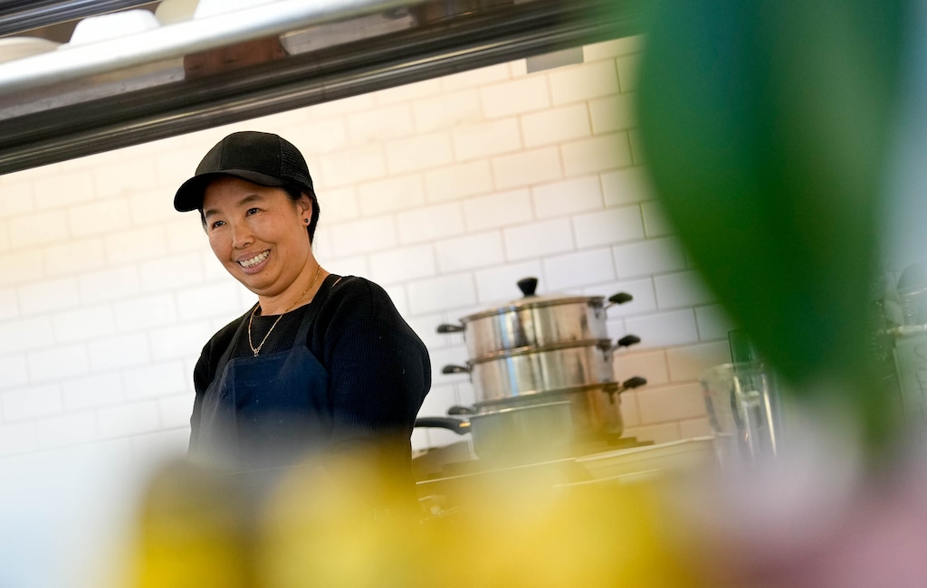 (Francisco Kjolseth | The Salt Lake Tribune) Jadim Lahpai, owner of Shwe Letyar Sushi at Woodbine Food Hall in Salt Lake, prepares food on Wednesday, April 3, 2024. Lahpai might be one of the few if not only people making and selling Burmese food options on her menu in Utah.