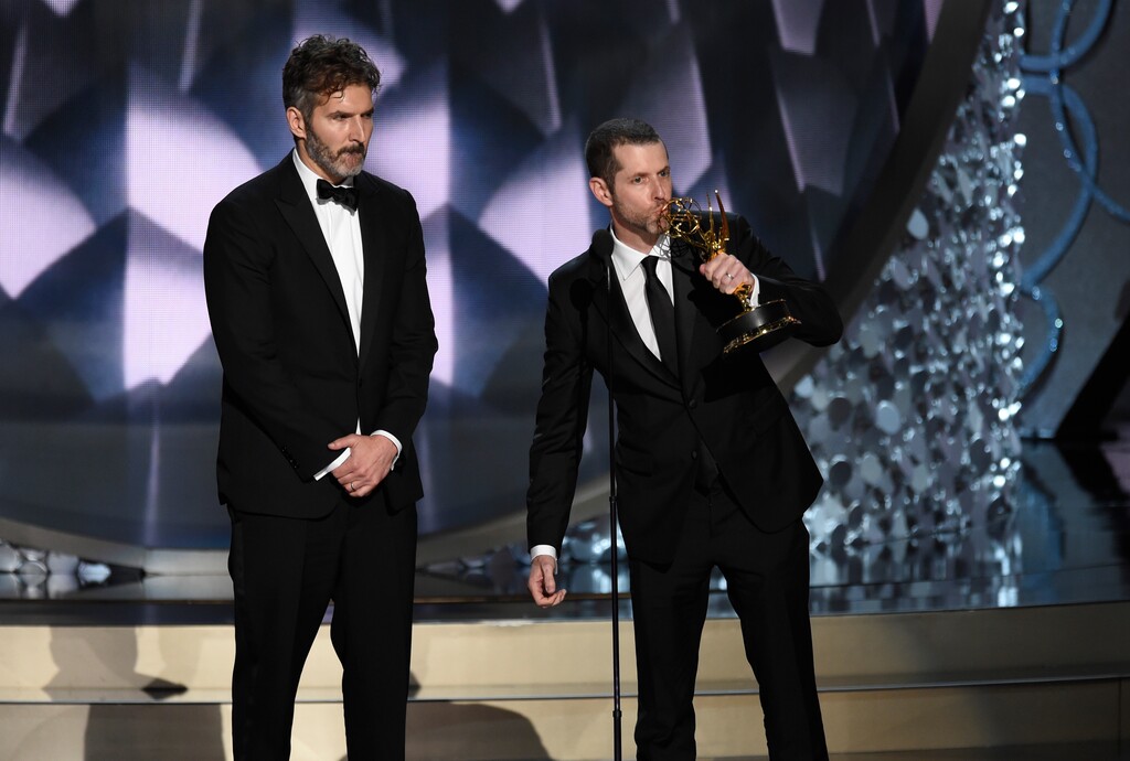 David Benioff, left, and D.B Weiss accept the award for outstanding writing for a drama series for Game of Thrones at the 68th Primetime Emmy Awards on Sunday, Sept. 18, 2016, at the Microsoft Theater in Los Angeles. (Photo by Chris Pizzello/Invision/AP)