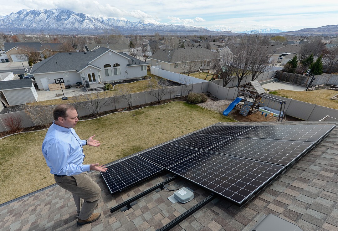 (Francisco Kjolseth  |  The Salt Lake Tribune)  Doug McAllister of South Jordan bought a solar panel array from Legend Solar last September. In December, Legend Solar started putting the panels but never finished. McAllister owes more than $12,000 on a loan he took out to finance the panels. The company has indicated to him that they are unable to hire an electrician to finish the job and the array sits idle on his roof, two panels short and unconnected. 