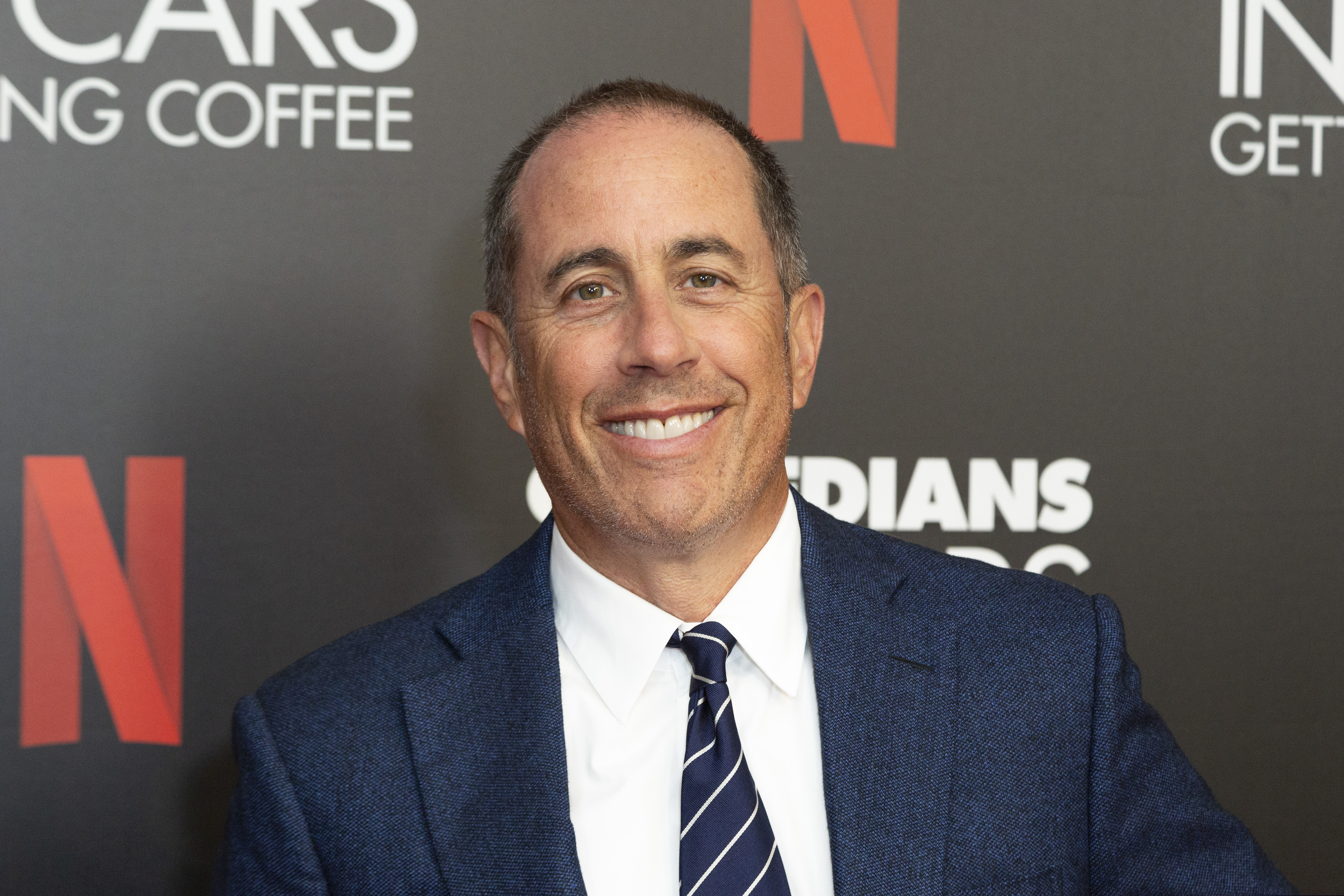 (Willy Sanjuan | Invision | AP) Comedian Jerry Seinfeld, shown in 2019, has drawn flak for his reaction to the Israel-Hamas war.