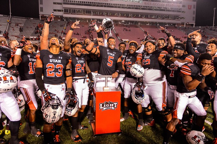 (Trent Nelson | The Salt Lake Tribune) Utah players celebrate the win as the Utah Utes host the San Jose State Spartans, NCAA football at Rice-Eccles Stadium in Salt Lake City, Saturday September 16, 2017.