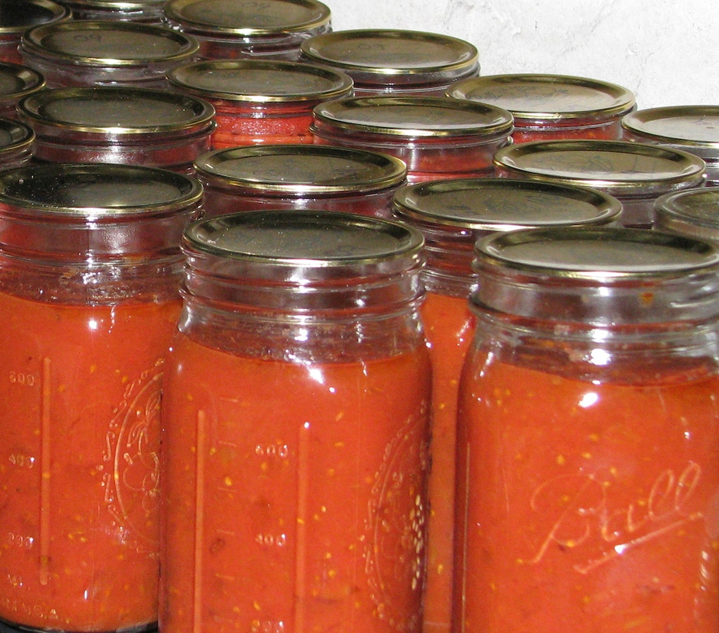 (Lee Reich | AP) This undated photo shows canned tomatoes in jars in New Paltz, N.Y. Salt Lake Tribune guest columnist Eli McCann has discovered that canning is in his blood.