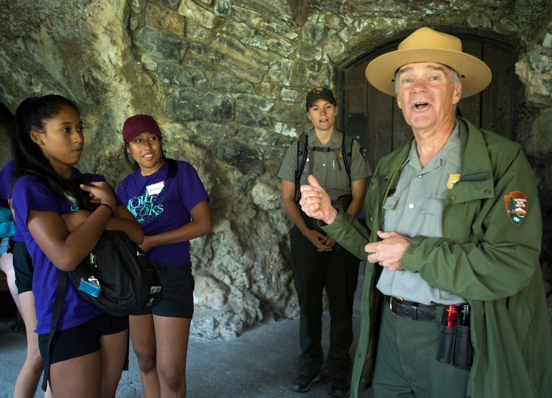 (Rick Egan  |  The Salt Lake Tribune)  Participants in the YouthWorks program listen to Ranger Royce Shelley, as he tells the story of Timpanogos Cave, Thursday, Aug. 3, 2017.