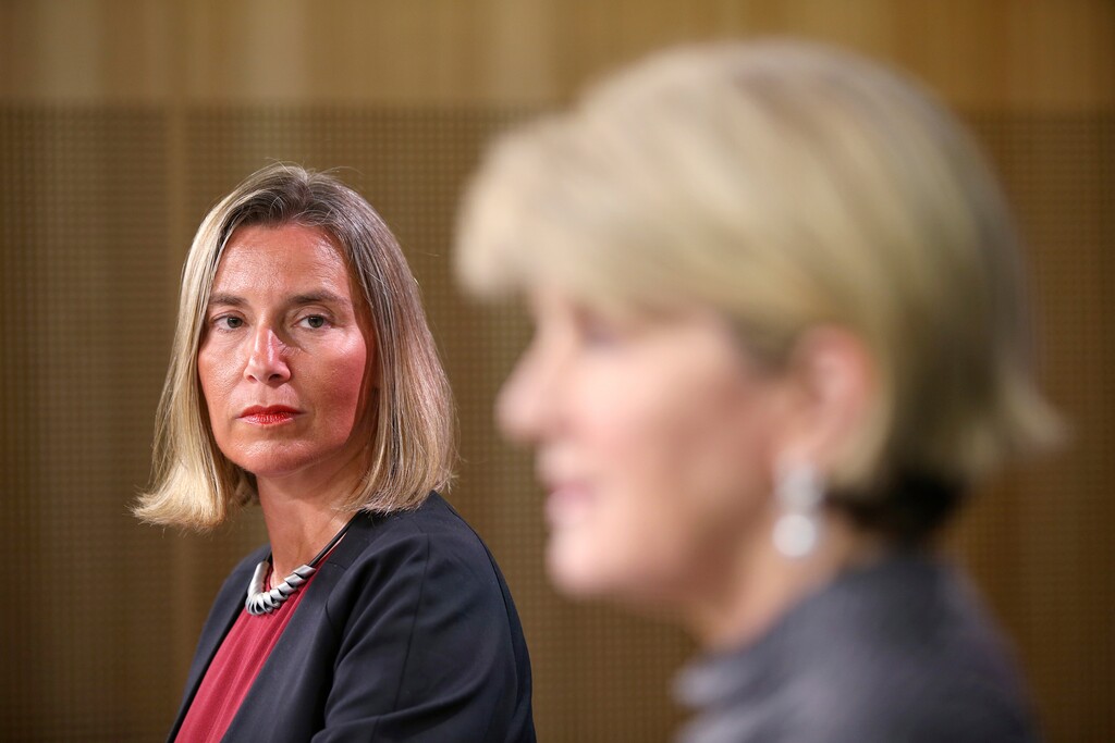 (Rick Rycroft | The Associated Press) European Union’s foreign policy chief, Federica Mogherini, left, watches Australia's Foreign Minister Julie Bishop speak during a joint press conference in Sydney, Wednesday, Aug. 8, 2018. Mogherini said she wants a free trade agreement with Australia as soon as possible as an example against protectionism.