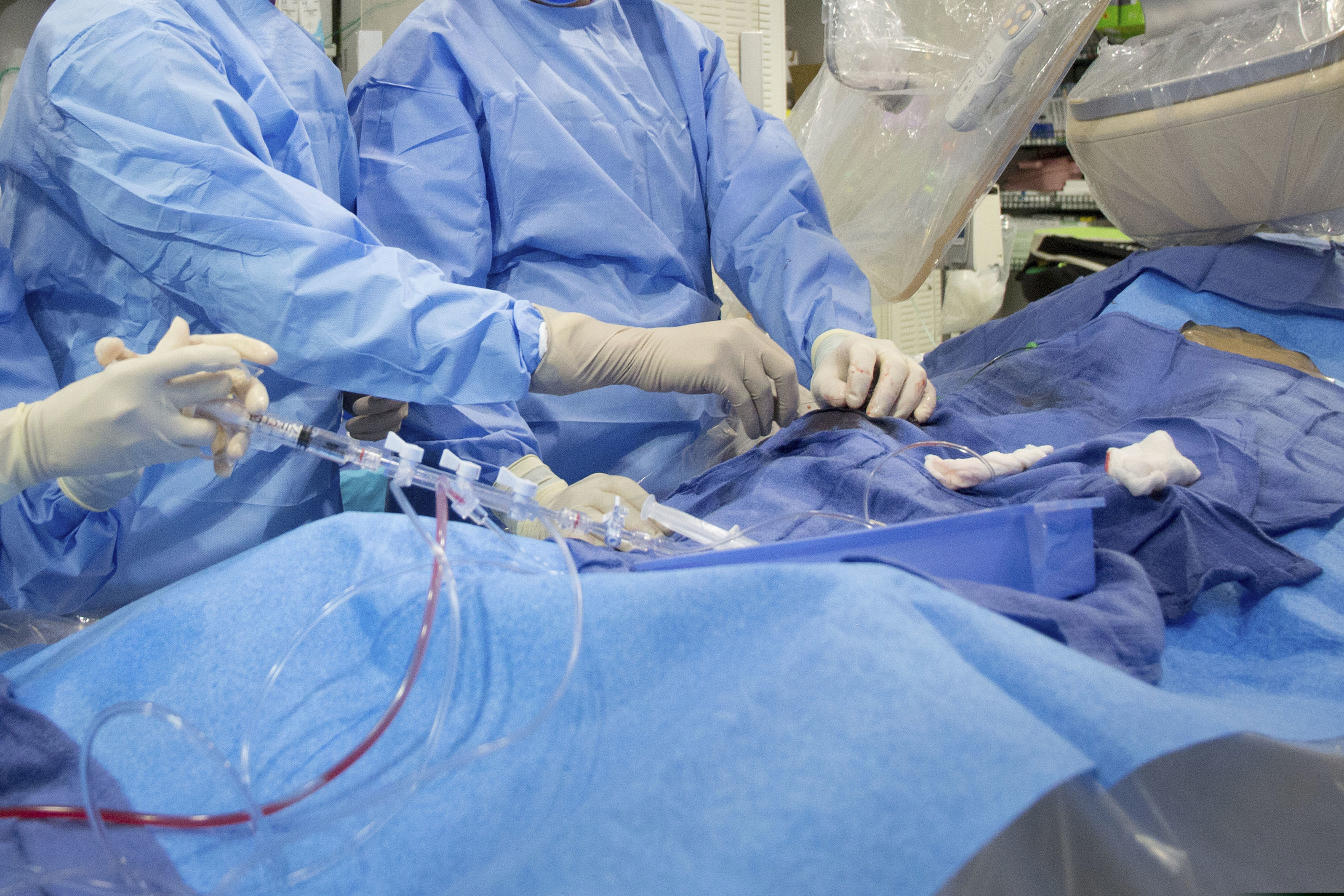 In this Feb. 16, 2017 file photo, surgeons perform a nonemergency angioplasty at Mount Sinai Hospital in New York. (AP Photo/Mark Lennihan)