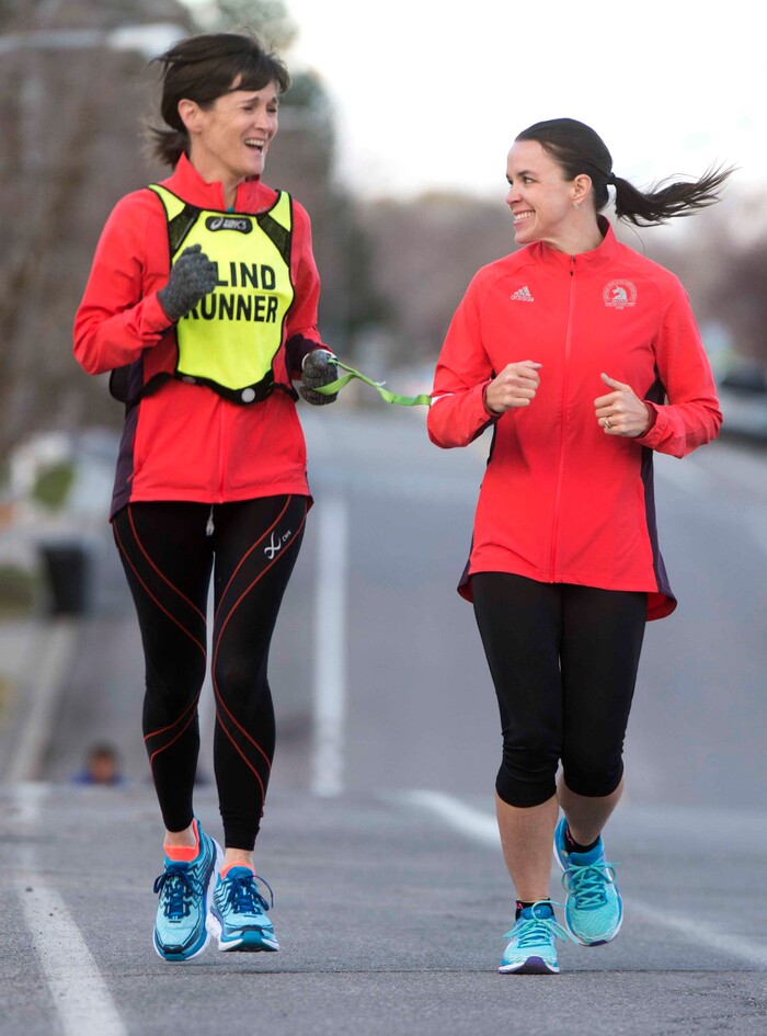(Rick Egan  |  The Salt Lake Tribune)        Becky Andrews and Alanna Whetsel train for the Boston Marathon by running along David Blvd in Bountiful, Thursday, March 29, 2018.


