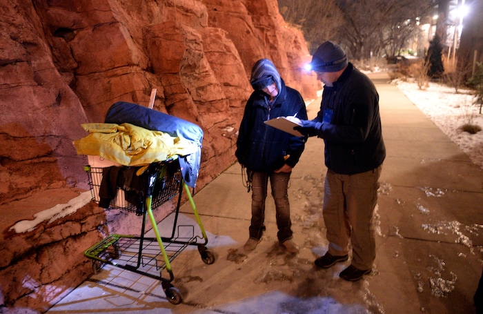 (Al Hartmann | The Salt Lake Tribune)
Shawn Spalding, with Volunteers of America outreach, right, interviews Tammy, who said that she's been homeless for the past 13 years, during the annual Point In Time count of homeless people in Salt Lake City at 5 a.m. Thursday, Jan. 25, 2018.