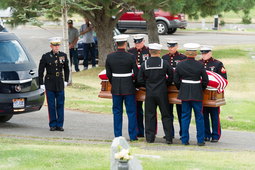 (Alex Gallivan  |  Special to the Tribune) Members of the Marine Corp Honor Guard receive the body of Marine Pfc. Robert K. Holmes, who died 77 years ago aboard the USS Oklahoma during the attack on Pearl Harbor, is laid to rest in the Salt Lake City Cemetery, Monday, Aug. 20, 2018.