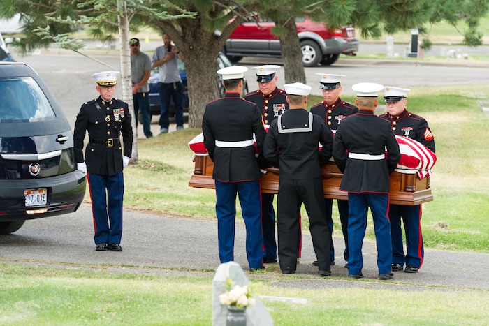 (Alex Gallivan  |  Special to the Tribune) Members of the Marine Corp Honor Guard receive the body of Marine Pfc. Robert K. Holmes, who died 77 years ago aboard the USS Oklahoma during the attack on Pearl Harbor, is laid to rest in the Salt Lake City Cemetery, Monday, Aug. 20, 2018.