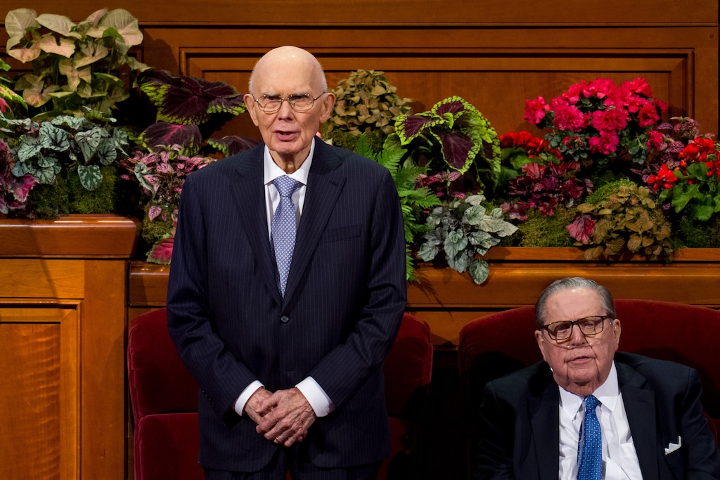 (Trent Nelson  |  The Salt Lake Tribune) Dallin H. Oaks sings the hymn "We Thank Thee, O God, for a Prophet" at General Conference in October. Apostle Jeffrey R. Holland, at his right, died Dec. 27, 2025.