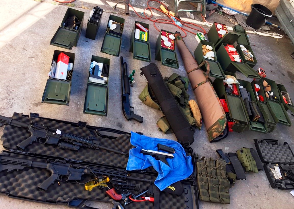 (Long Beach Police Department via AP file photo) This undated photo released Wednesday, Aug. 21, 2019 by the Long Beach, Calif., Police Department shows weapons and ammunition seized from a cook at a Los Angeles-area hotel who allegedly threatened a mass shooting. Authorities say he had guns and hundreds of rounds of ammunition at his home. Rodolfo Montoya was arrested Tuesday, Aug. 20, a day after allegedly telling a co-worker at the Long Beach Marriott he planned to shoot fellow workers and others.