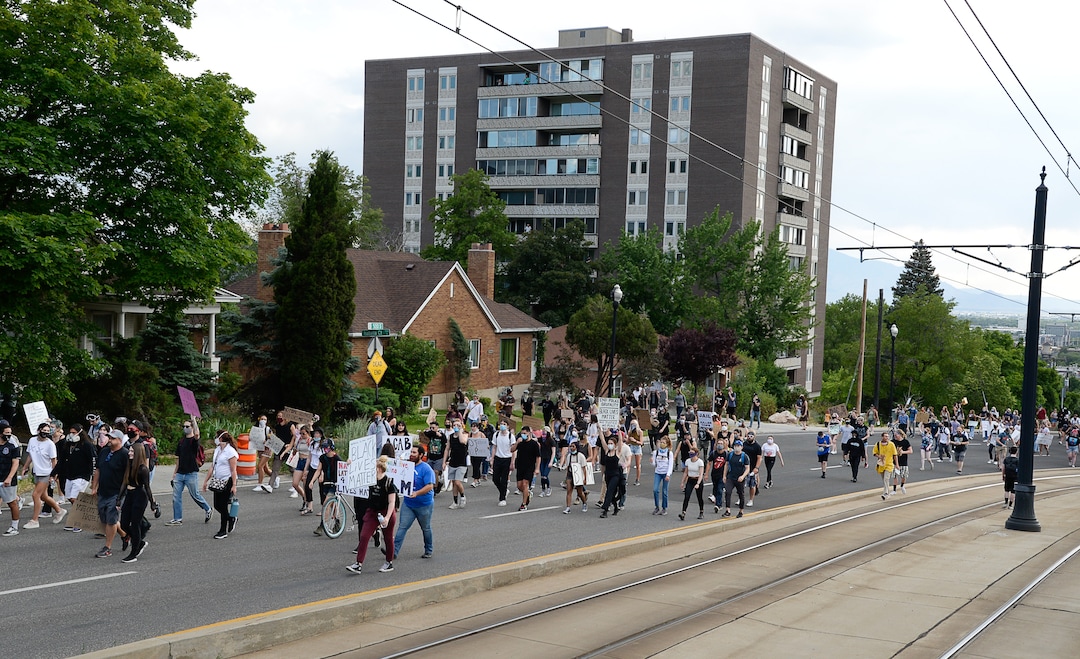 (Francisco Kjolseth  |  The Salt Lake Tribune) Demonstrators protesting against police brutality make their way to the University of Utah on Wednesday, June 3, 2020, in Salt Lake City, as the initially set 8 p.m. weeklong curfew was removed.