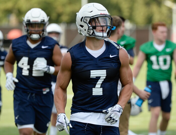 (Francisco Kjolseth  |  The Salt Lake Tribune)  BYU's Beau Hoge runs through drills as the team opens preseason training camp on their practice field on Thursday, Aug. 2, 2018.