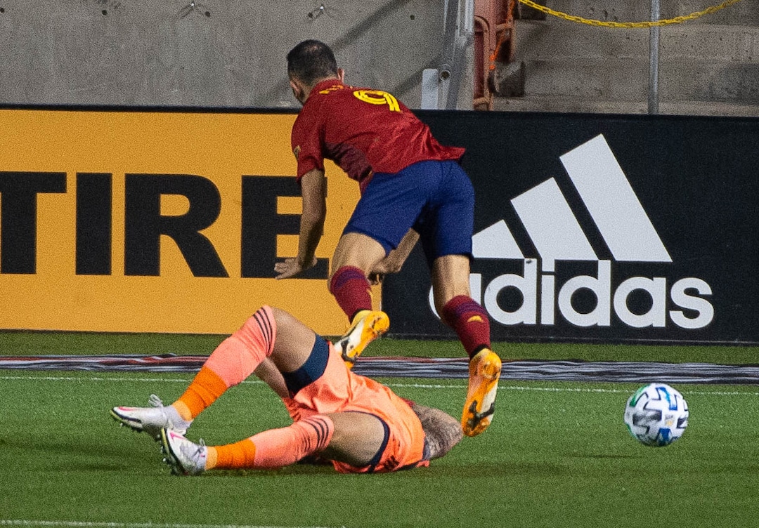 (Francisco Kjolseth  |  The Salt Lake Tribune) Los Angeles Galaxy goalkeeper David Bingham (1) draws the yellow card taking out the legs of Real Salt Lake forward Justin Meram (9) allowing a penalty kick and a first goal for RSL as Real Salt Lake hosts L.A. Galaxy at Rio Tinto Stadium in Sandy on Wednesday, Sept. 23, 2020.