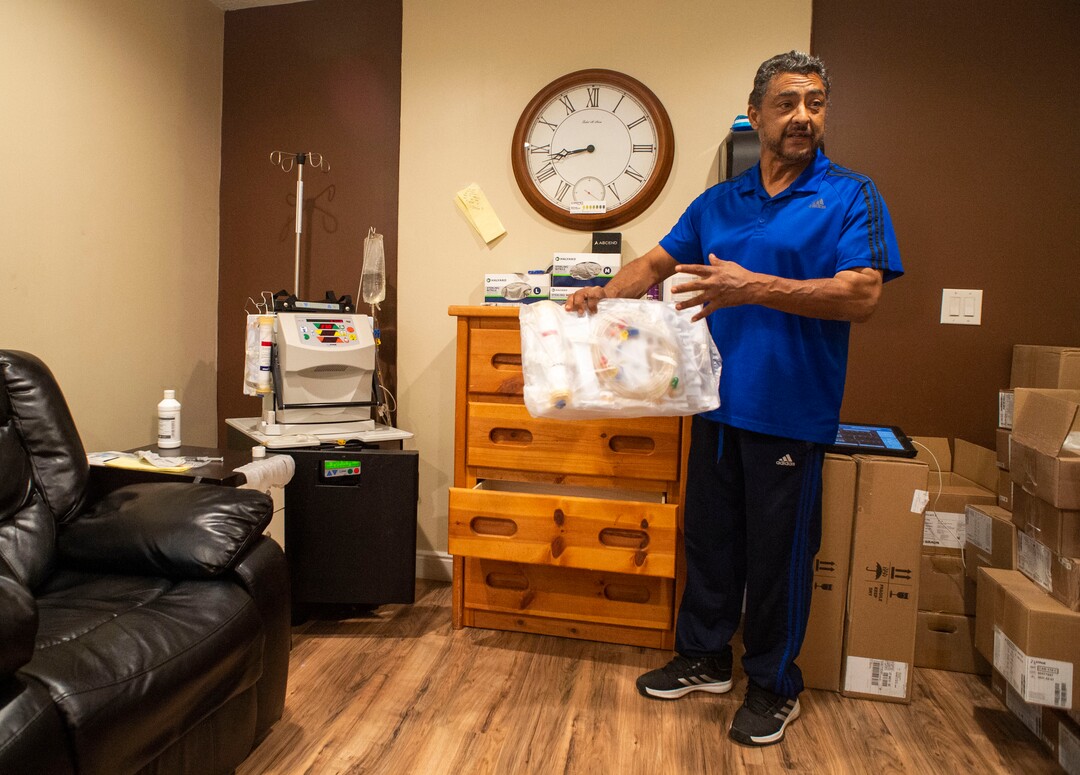 (Rick Egan  |  The Salt Lake Tribune)     Raul Gutierrez goes through the steps to setup his machine, as an in-home dialysis patient. Thursday, Sept. 5, 2019.