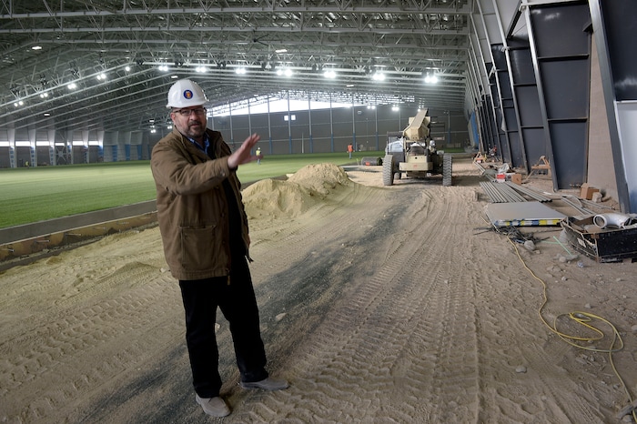 (Al Hartmann  |  The Salt Lake Tribune) 	
Dan Boyd, with Wasatch Restaurant Group shows area area for food and concessions in the the RSL Academy charter school's indoor soccer arena.  It's huge. Housing two side by side soccer fields, seating and a concessions area.  It's believed to be the largest pre-fabricated single span building in the world.  It will open mid January 2018.  