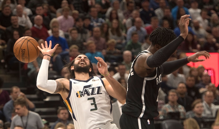 (Rick Egan  |  The Salt Lake Tribune) Utah Jazz guard Ricky Rubio (3) is fouled by Brooklyn Nets forward Rondae Hollis-Jefferson (24), in NBA action, Utah Jazz vs. Brooklyn Nets, in Salt Lake City, Saturday, November 11, 2017.