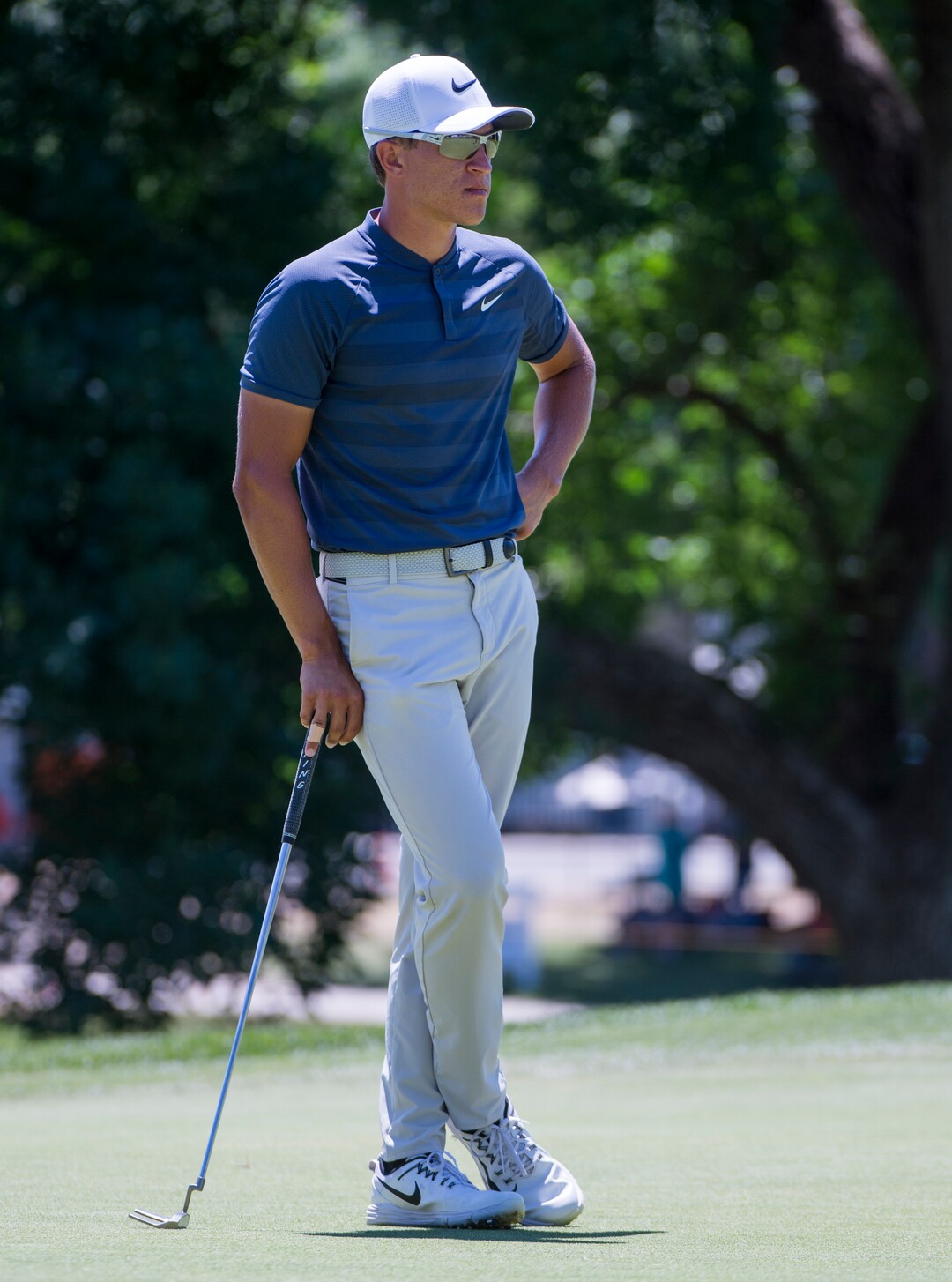 (Rick Egan  |  The Salt Lake Tribune)     Cameron Champ from Sacrament, CA, waits for his turn to putt, during the Utah Championship golf event on the Web.com Tour at Oakridge Country Club in Farmington. Champ finished 17-under par to lead the field for the second day in a row. July 13, 2018.