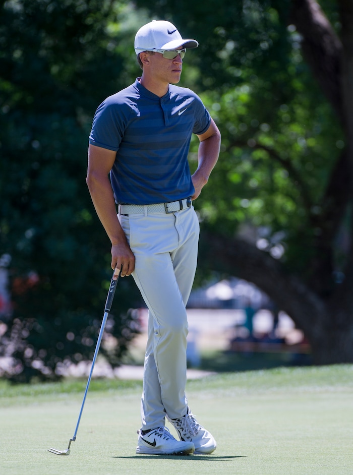 (Rick Egan  |  The Salt Lake Tribune)     Cameron Champ from Sacrament, CA, waits for his turn to putt, during the Utah Championship golf event on the Web.com Tour at Oakridge Country Club in Farmington. Champ finished 17-under par to lead the field for the second day in a row. July 13, 2018.


