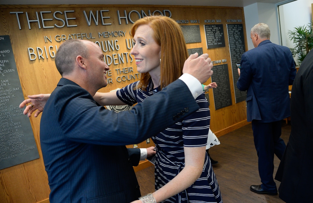 (Francisco Kjolseth  |  The Salt Lake Tribune)  Lt. Gov. Spencer Cox embraces Jenny Taylor following a service at Brigham Young University that honors the life and legacy of her husband, Major Brent Taylor, former mayor of North Ogden and a BYU Army ROTC alumnus during a ceremony at the Ernest L. Wilkinson Student Center in Provo on Thursday, May 23, 2019. The BYU Army ROTC unveiled the updated Memorial Wall, a list of BYU students and alumni who have died in service which will now include Major TaylorÕs name.